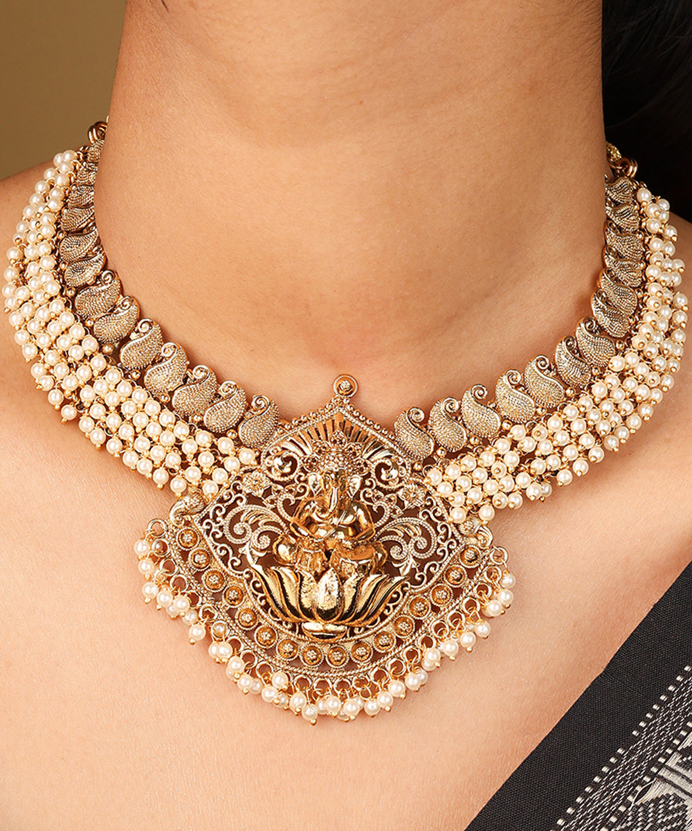 White Bead Necklace with Gold Plated Lakshmi Motif Pendant