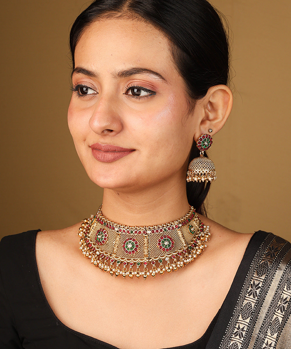Ancient Style Curved Gold Plated Necklace with Intricate Carvings and Beaded Earrings