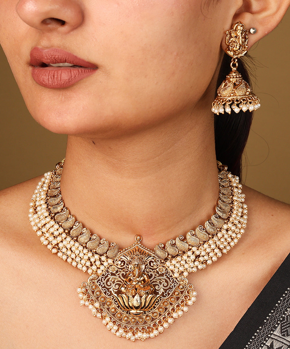 White Bead Necklace with Gold Plated Lakshmi Motif Pendant