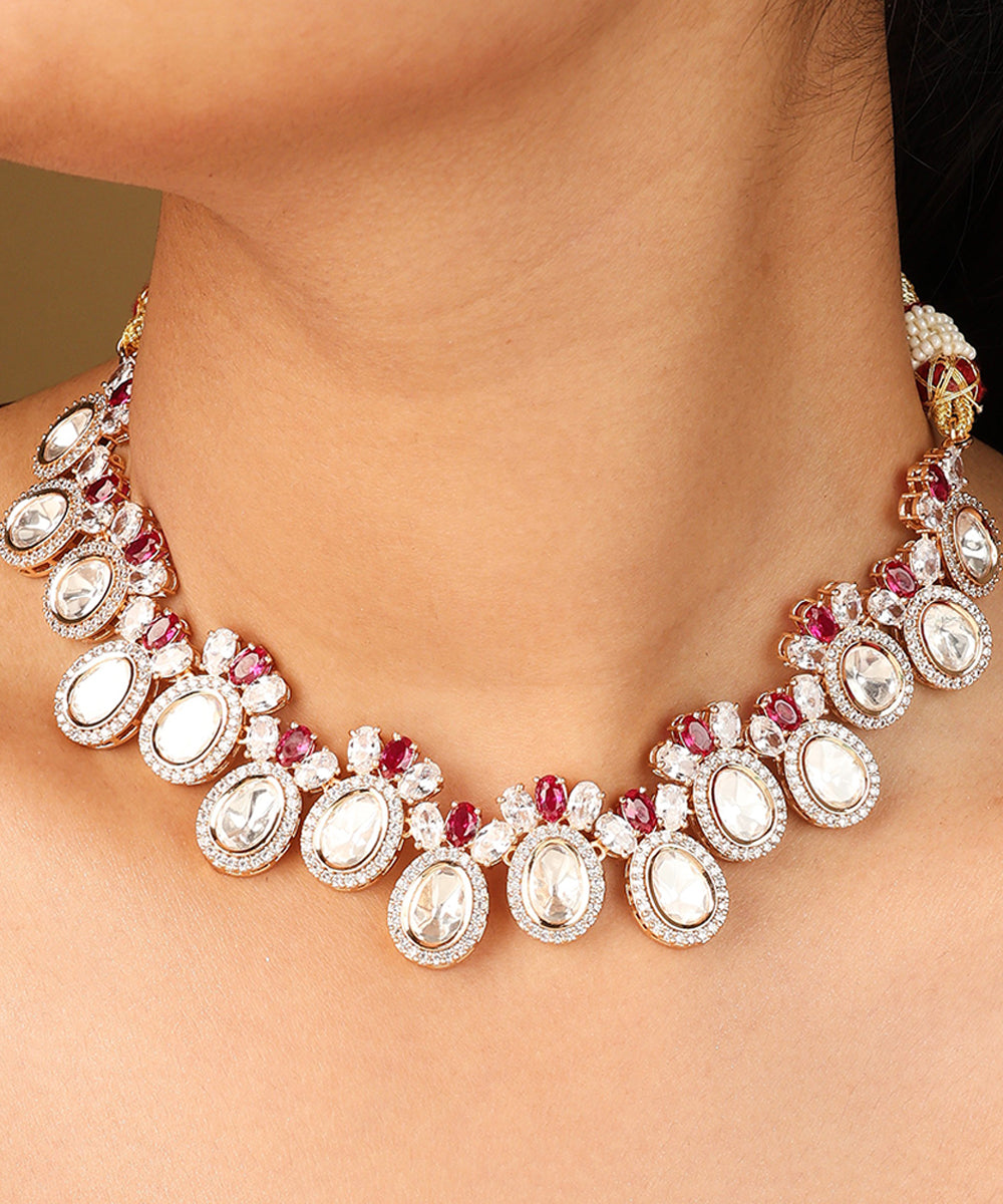 Raindrop Shaped Transparent Stone Necklace with Red Accents and Matching Earrings