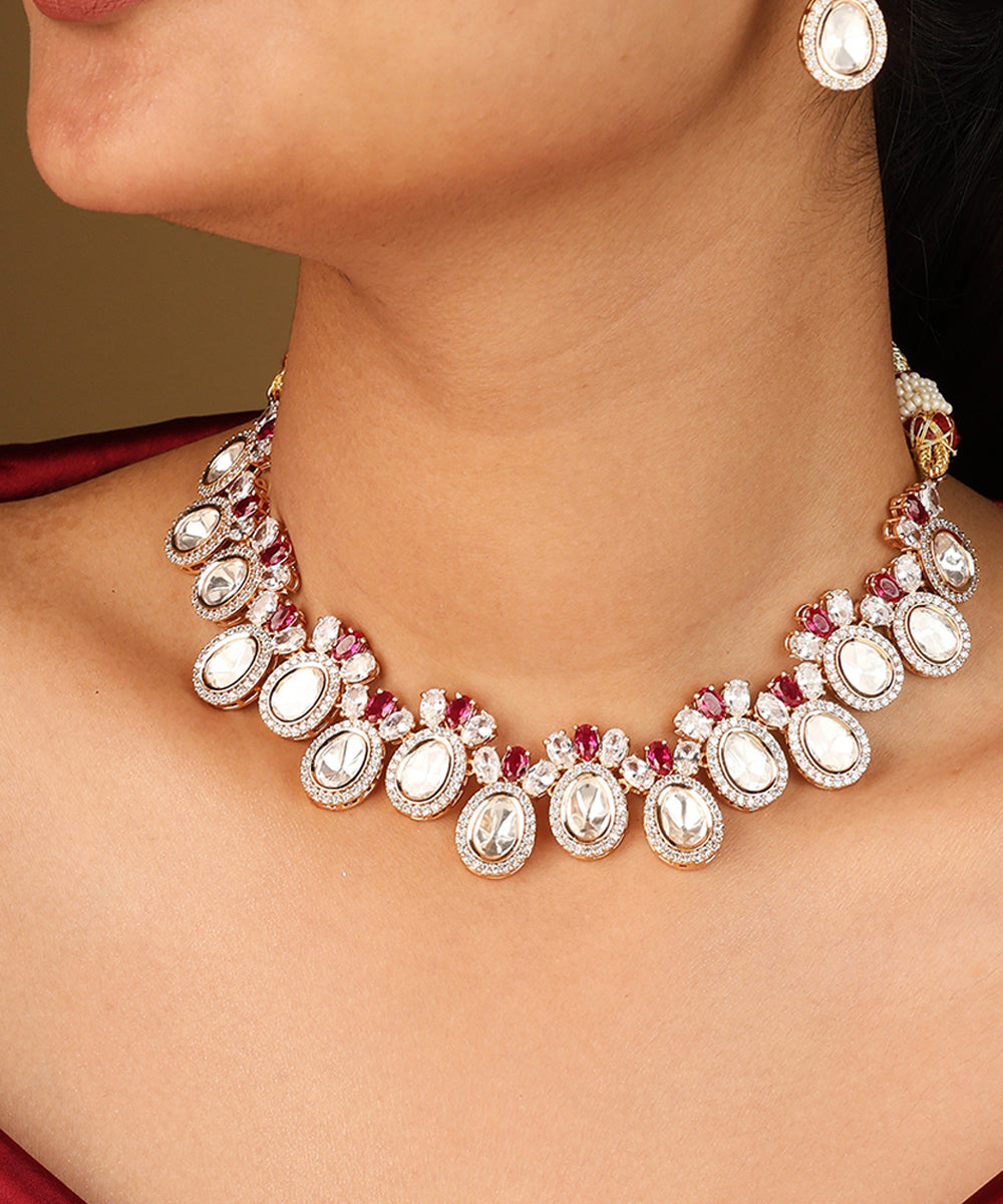 Raindrop Shaped Transparent Stone Necklace with Red Accents and Matching Earrings