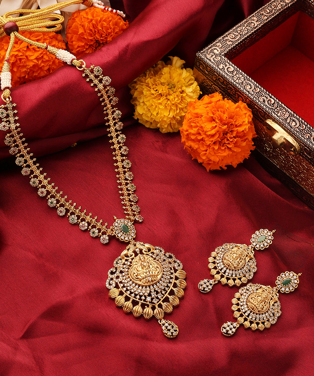 Gold Plated South Temple Style Necklace Set with American Stone Studded Lakshmi Motif Pendant