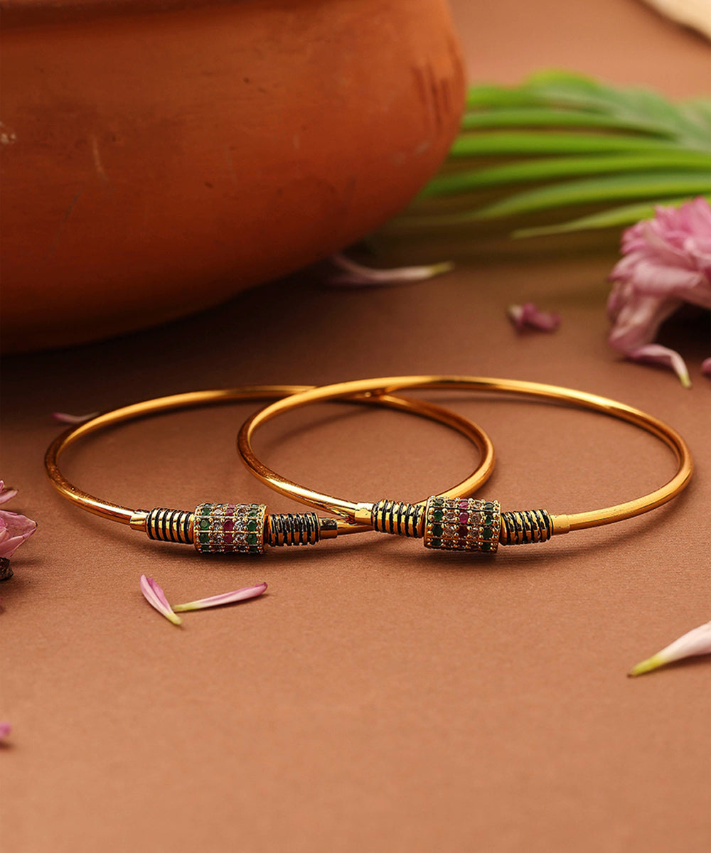 Gold-Plated Plain Bangles with Stone Studded Center Ball