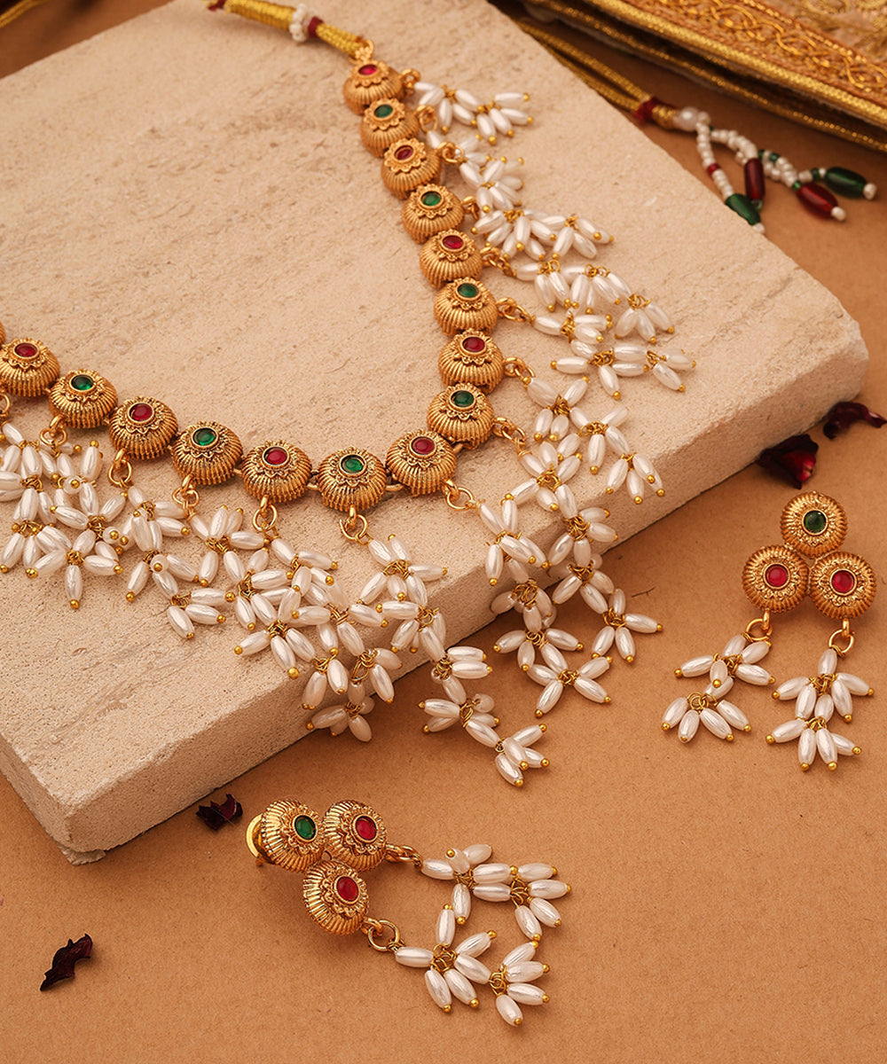 Gold Cup Necklace with Red Stones and White Oval Jhumkis