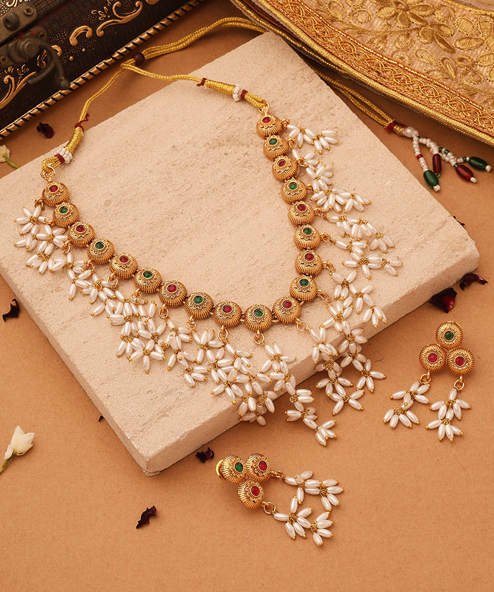 Gold Cup Necklace with Red Stones and White Oval Jhumkis