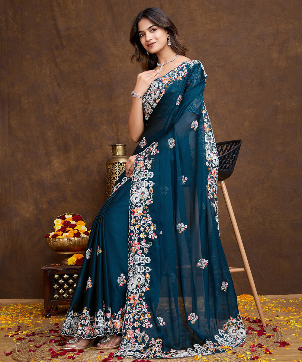 Peacock Blue Georgette Saree with Embroidered Border And Blouse