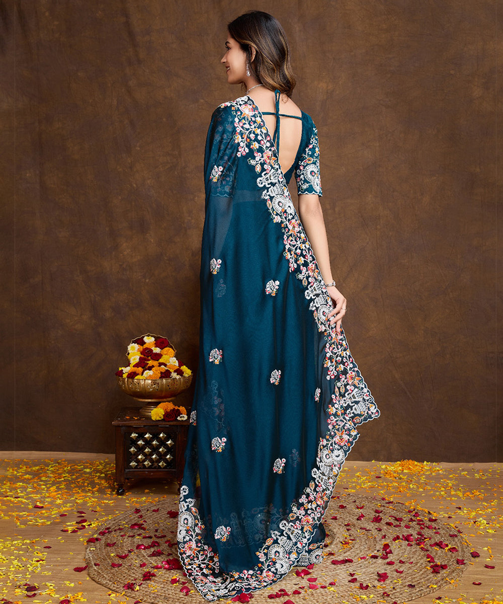 Peacock Blue Georgette Saree with Embroidered Border And Blouse