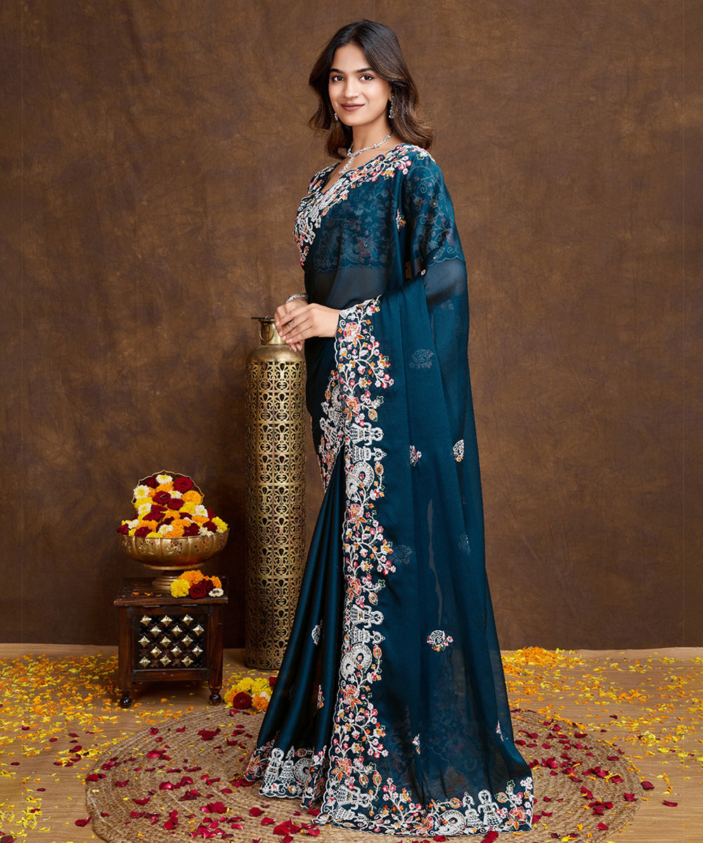 Peacock Blue Georgette Saree with Embroidered Border And Blouse