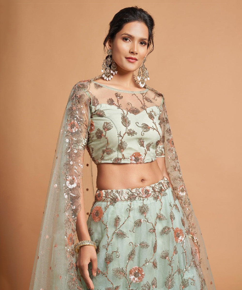 Pista Green Thread Embroidered Net Lehenga Choli Unstitched