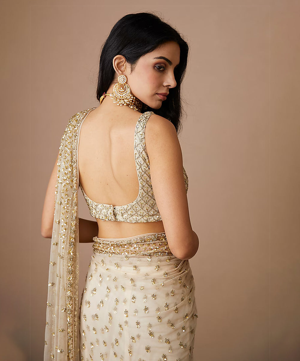 Golden Glimmer Net Saree with a Subtle Sheen
