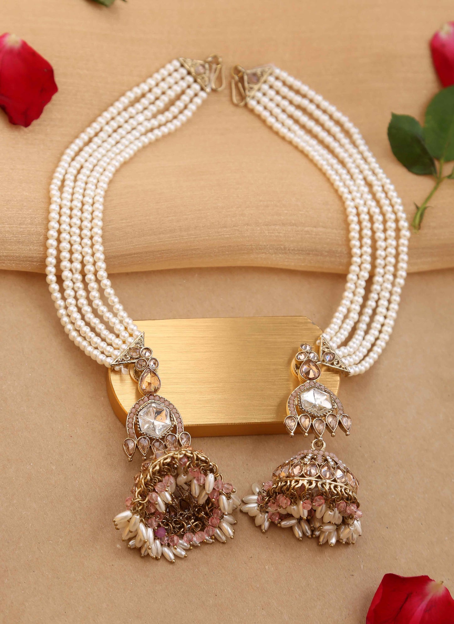 American diamond jhumkas with pearl ear chain and pink accents