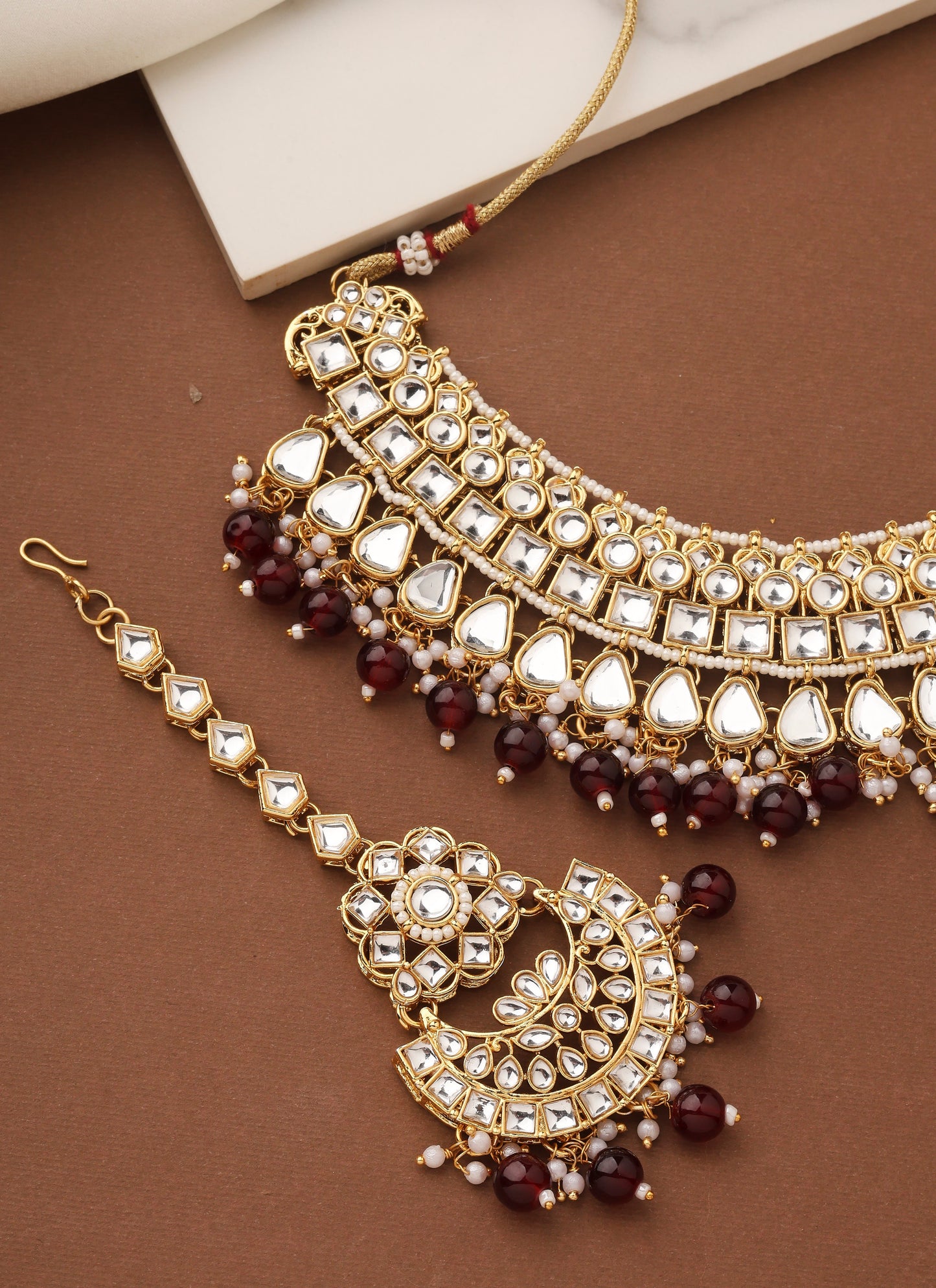 High Neck Kundan Necklace Set with Red Beads