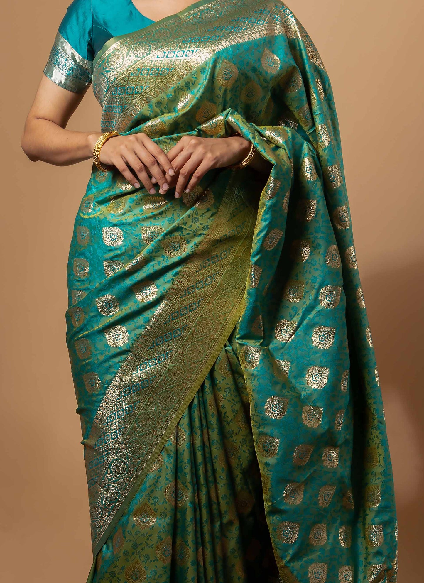 Turquoise Green Zari Woven Saree with Intricate Floral Motifs