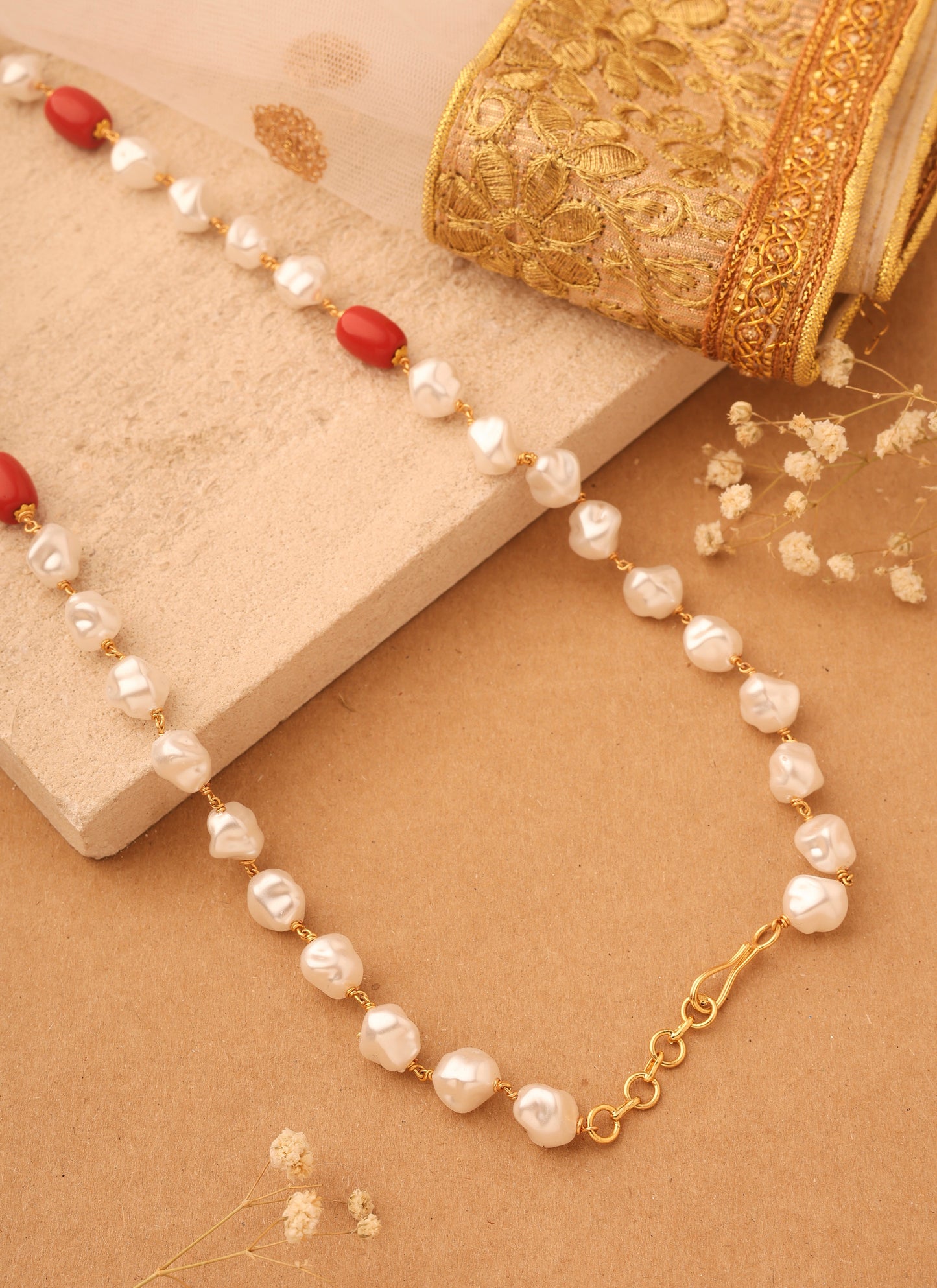 Natural Elegance: Necklace of Shapeless White Pearls with Orange-Red Accents