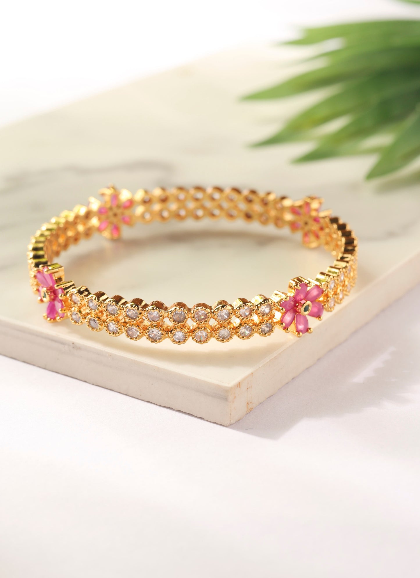 Set of two Gold Bangles with American Diamonds and Pink Stone Flowers
