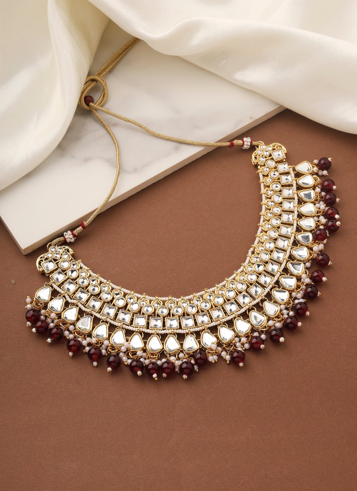 High Neck Kundan Necklace Set with Red Beads