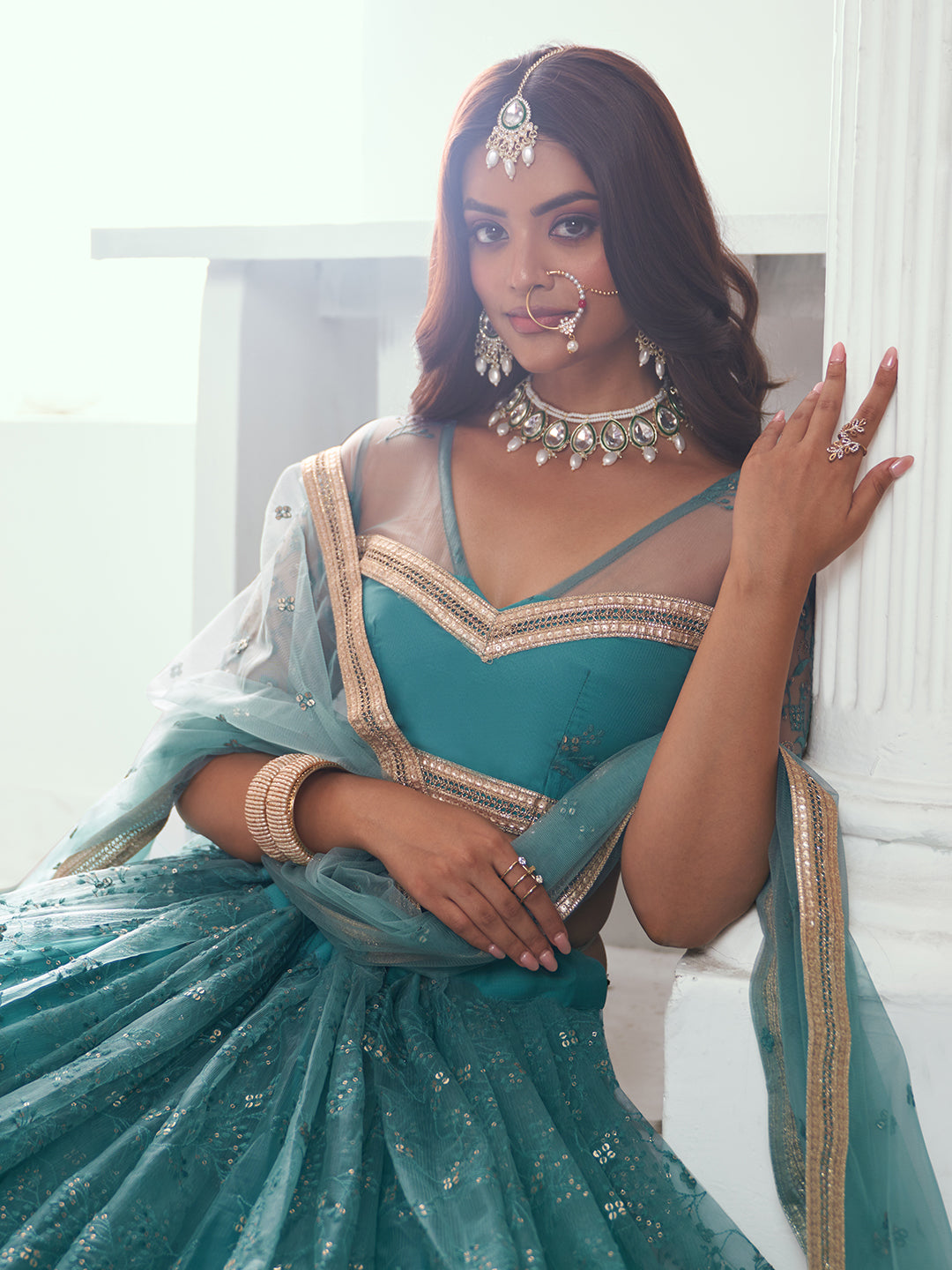 Stunning Rama Green Net Lehenga Choli with Embroidery Unstitched