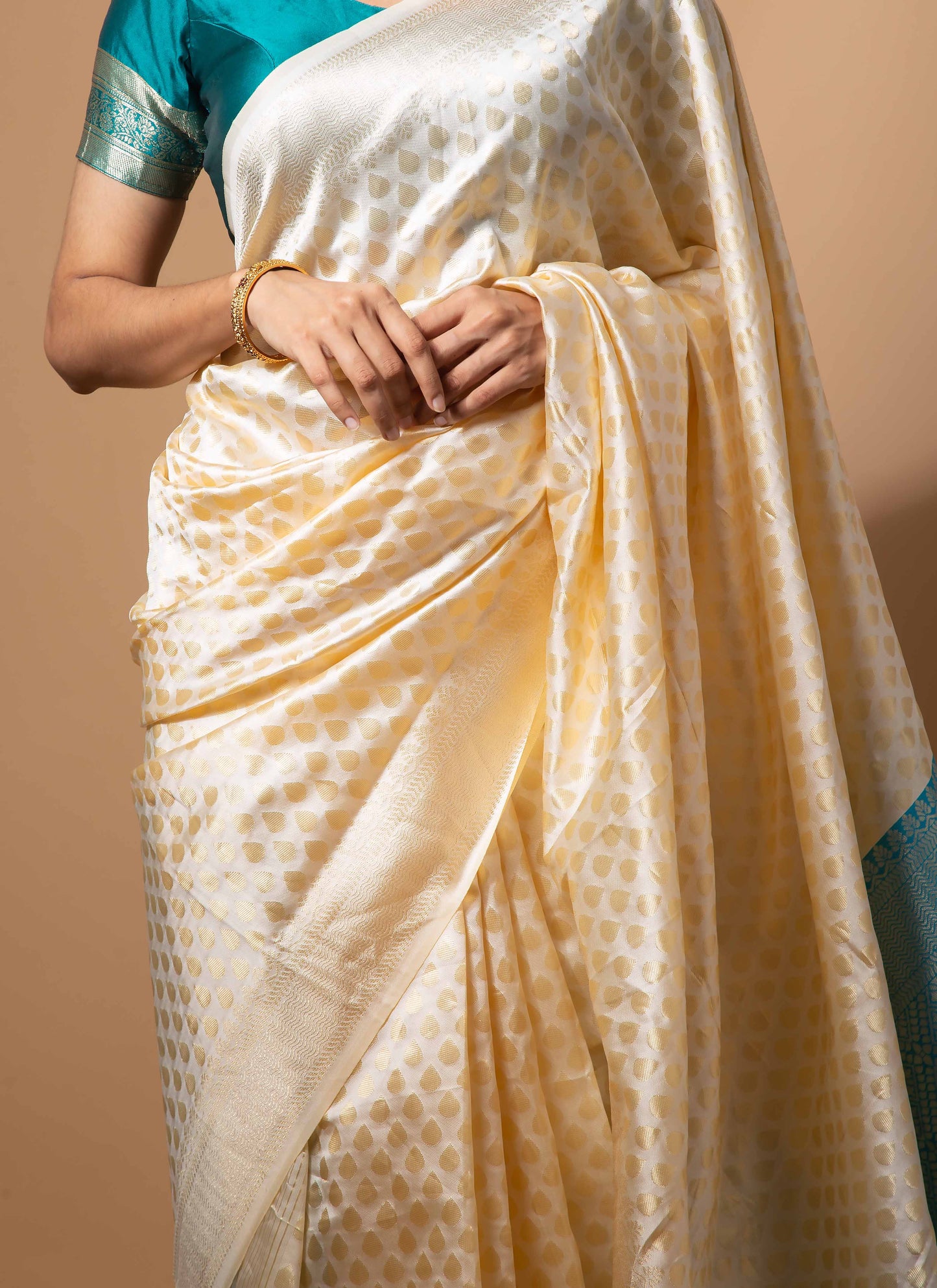 Ivory and Teal Zari Woven Saree with Intricate Motifs