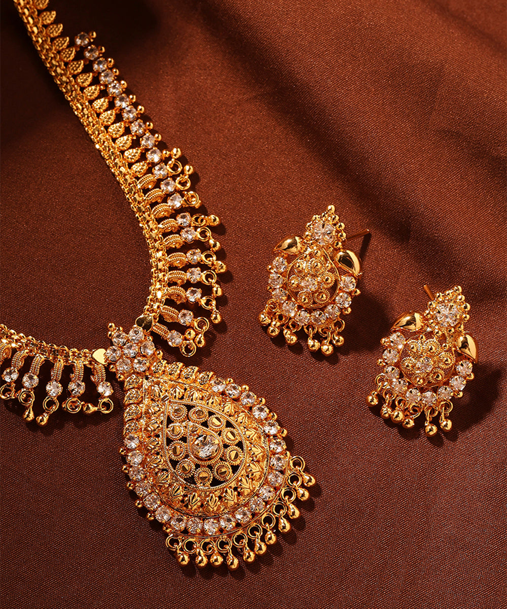 Gold Necklace Set with American Diamond Accents and Teardrop Pendant