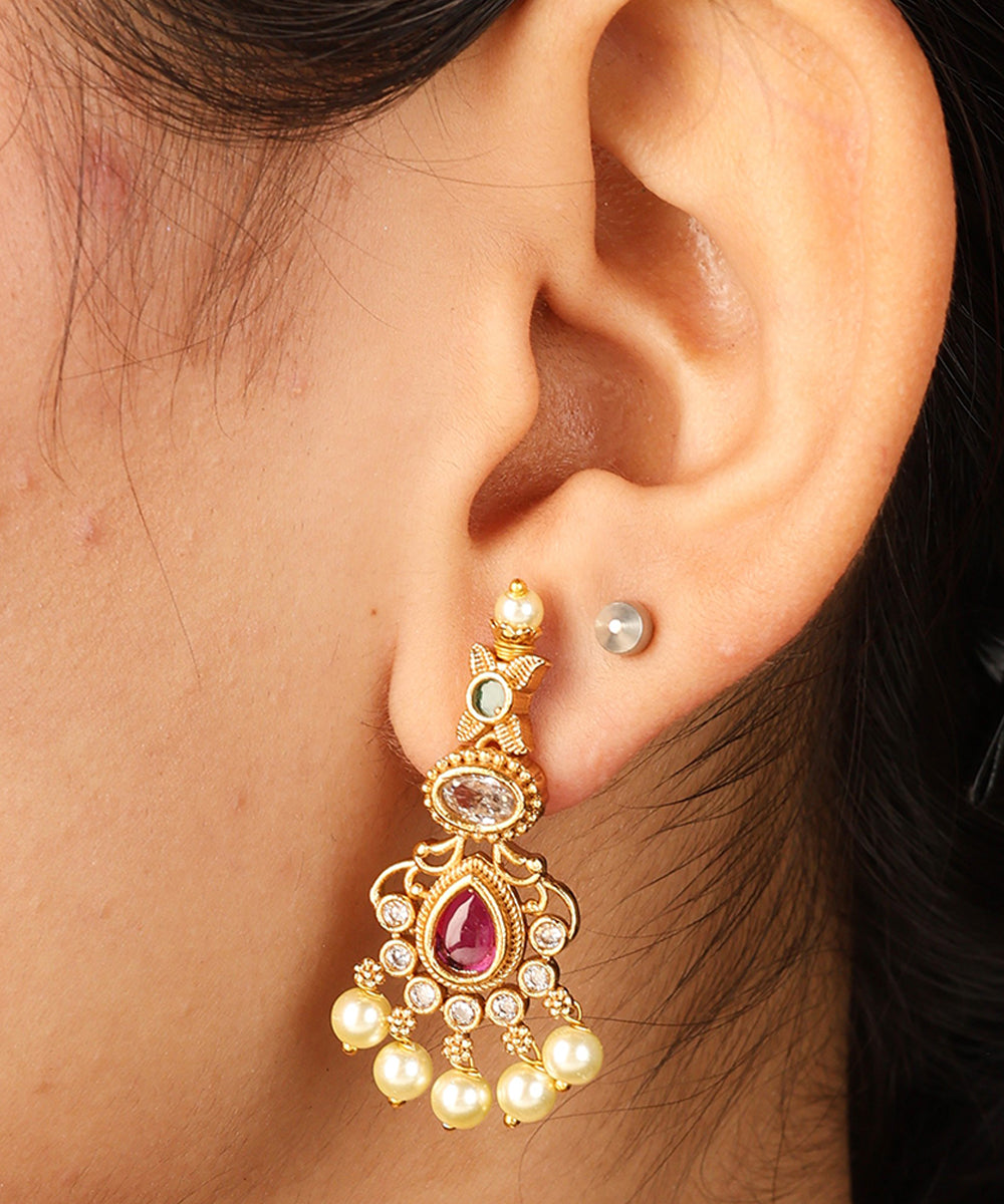 Guttapusalu Necklace with Tiny Jhumkis and Curved Detailing in Red Stones