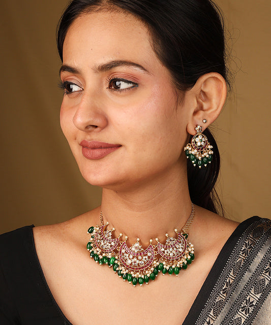 Moon Shaped Pendant Necklace with Dark Green Jhumkis and Matching Earrings
