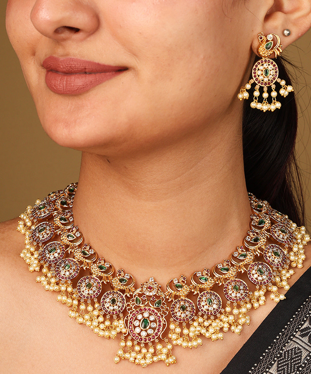 Gold Plated Guttapusalu Necklace with Red Stone Accents Jhumkis and Pearl Pendant