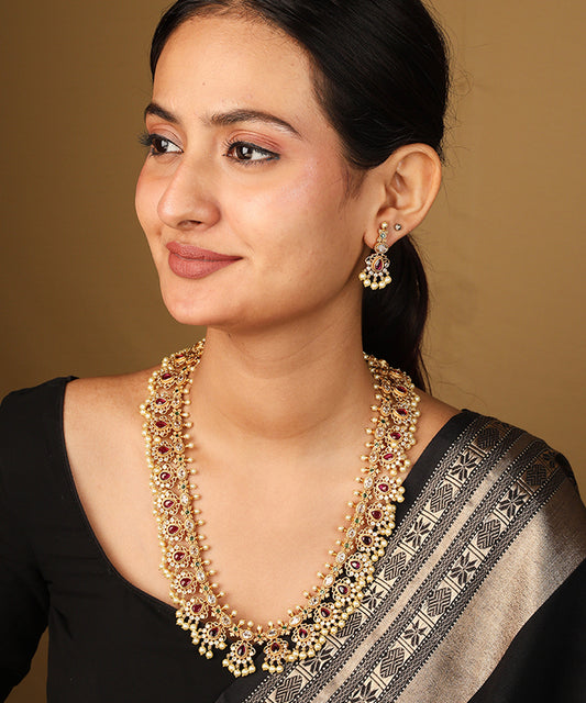 Guttapusalu Necklace with Tiny Jhumkis and Curved Detailing in Red Stones