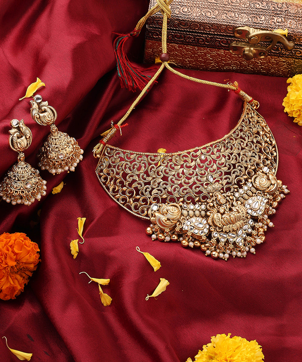 Statement Gold Plated Choker Set with Lakshmi Motif and Intricate Designs