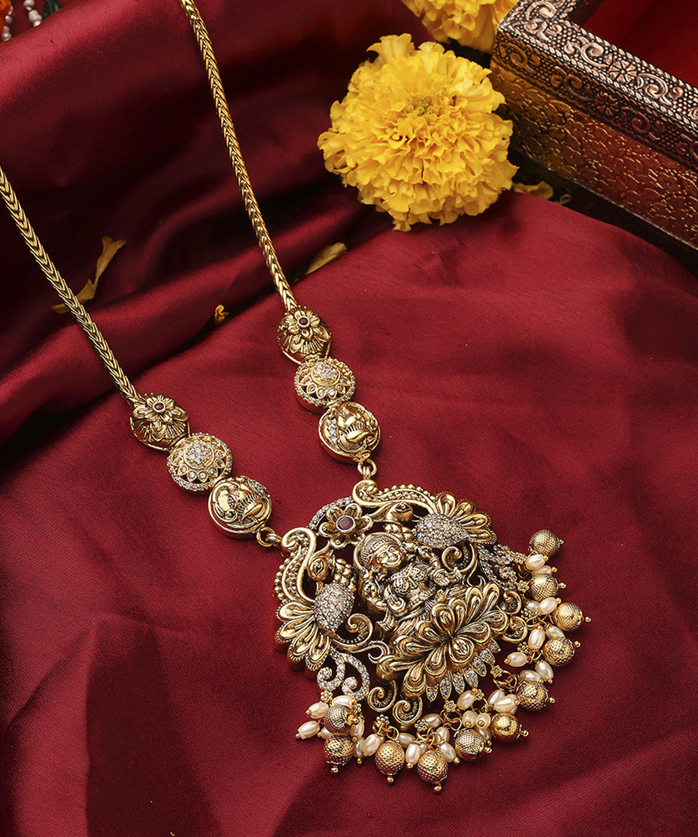 South Temple Style Gold Plated Necklace Set with American Stone Studded Lakshmi Motif Pendant