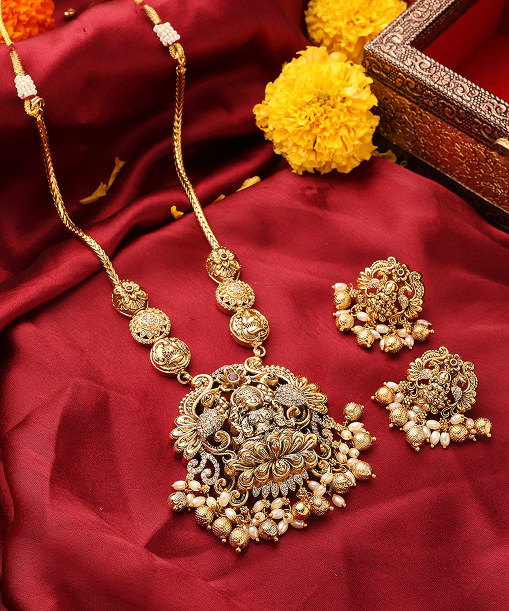 South Temple Style Gold Plated Necklace Set with American Stone Studded Lakshmi Motif Pendant