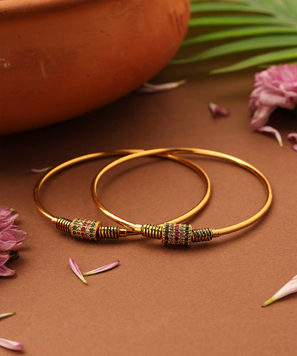 Gold-Plated Plain Bangles with Stone Studded Center Ball
