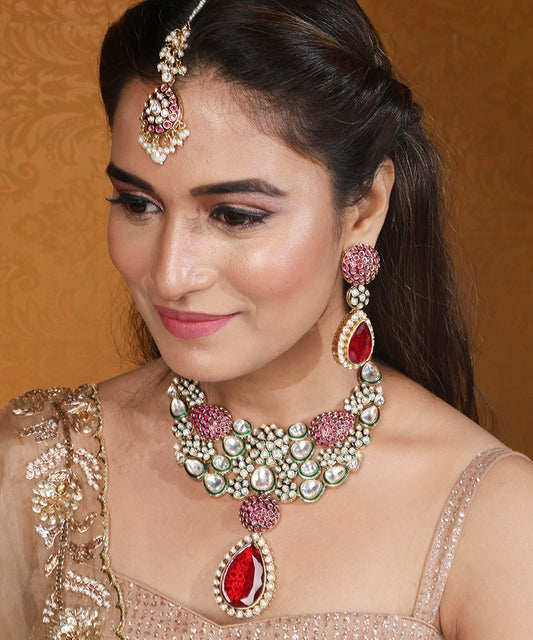 Jaipur Jadau Work Necklace Set with Red Stones Earrings and Maang Tikka in Kundan