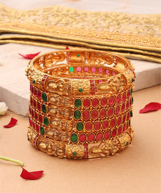 Broad Gold Plated Bangle with Intricate Motif and Gemstone Accents
