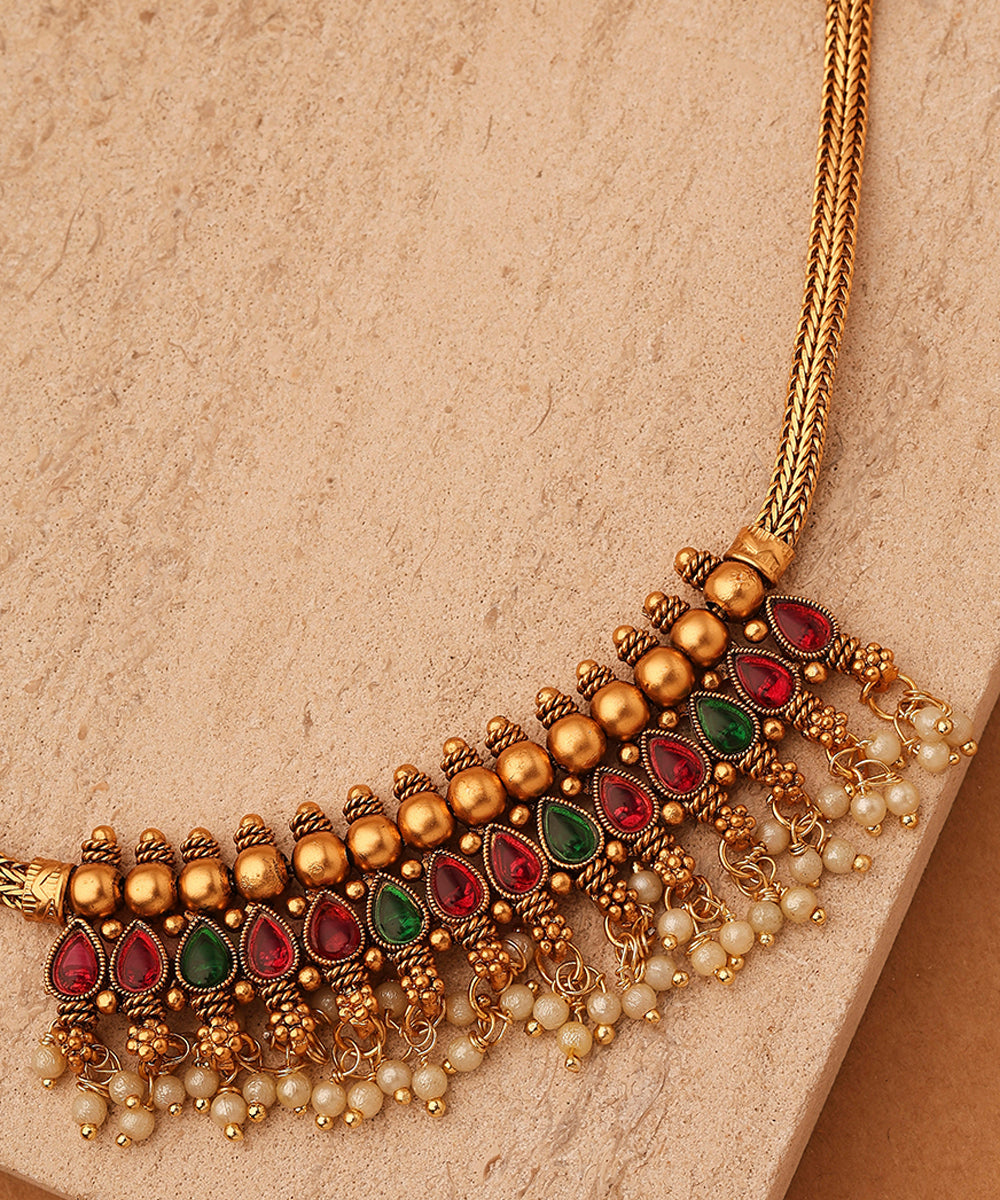 Red and Green Stone Necklace with Golden Jhumkis and Bead Accents