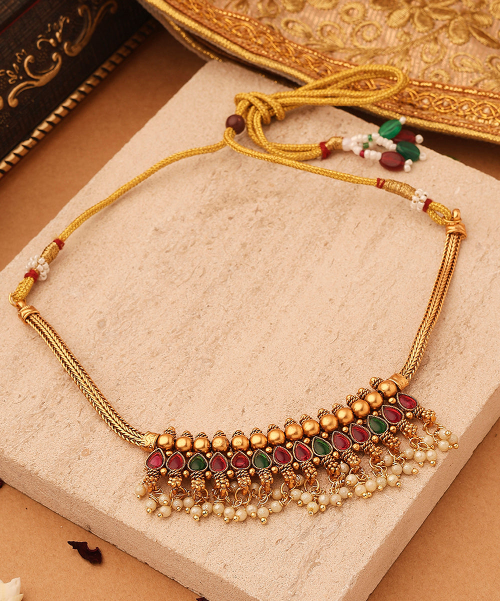 Red and Green Stone Necklace with Golden Jhumkis and Bead Accents