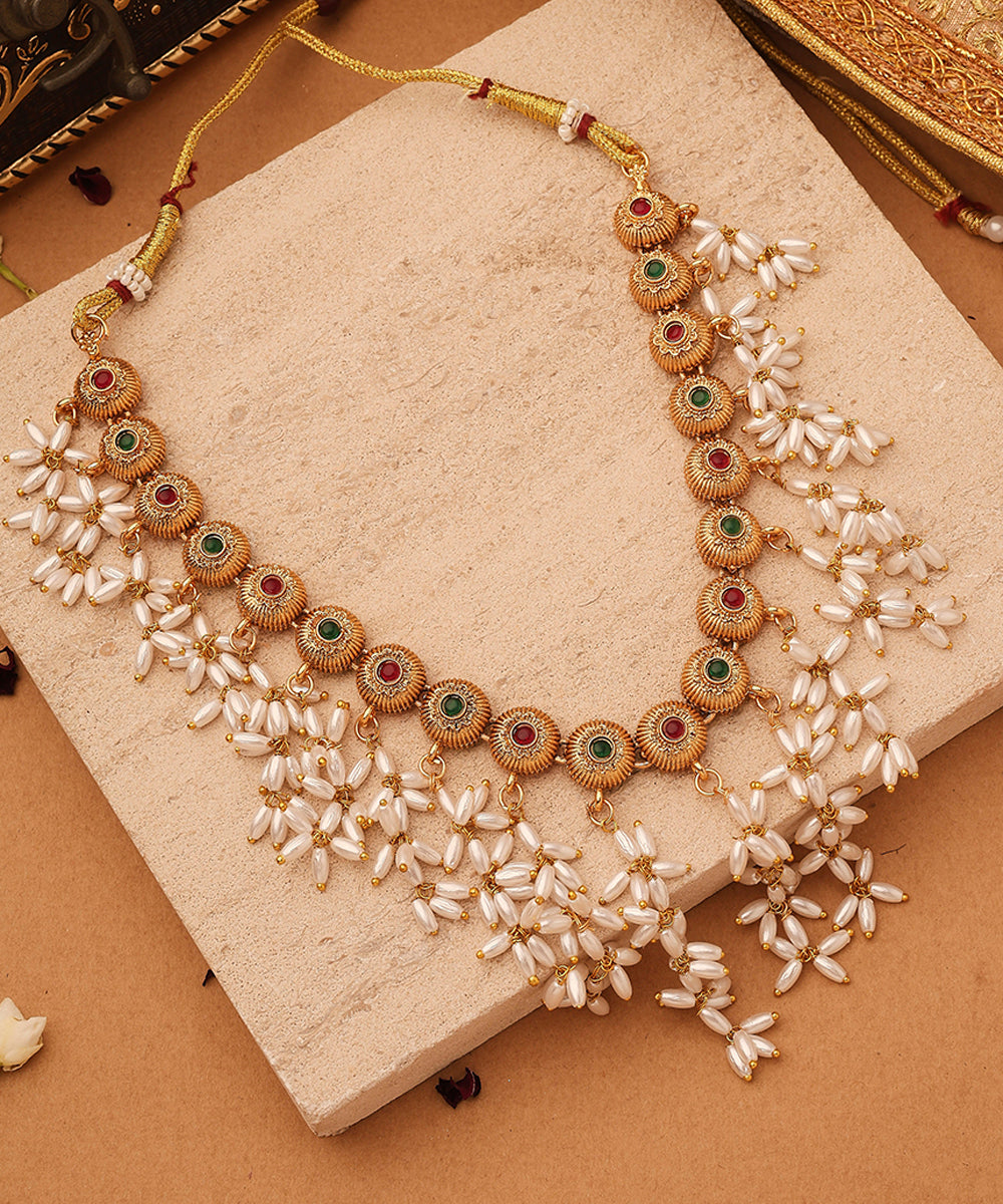Gold Cup Necklace with Red Stones and White Oval Jhumkis