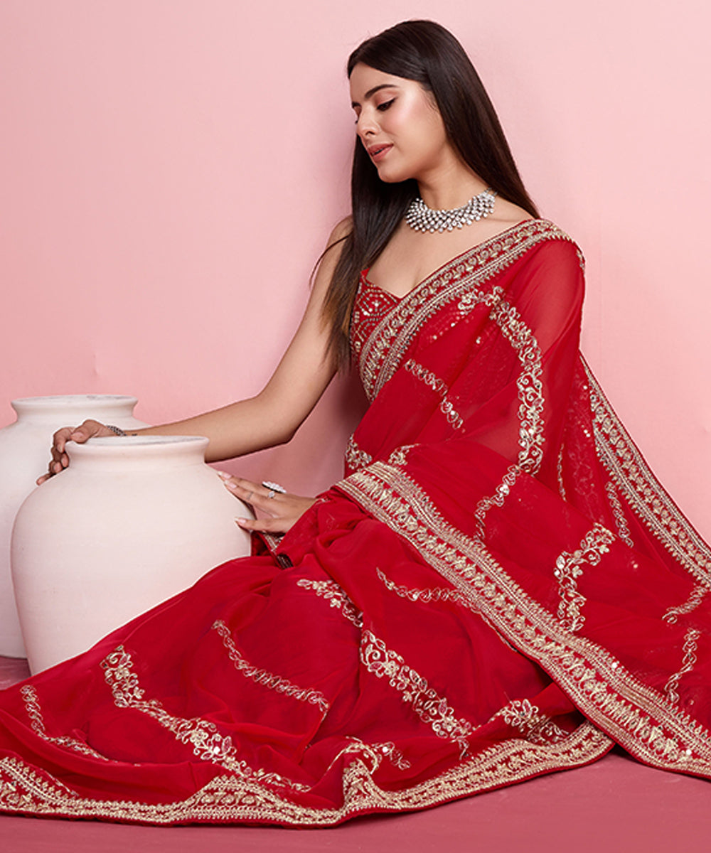 Red Organza Saree with Golden Lace Border and Elegant Embroidery