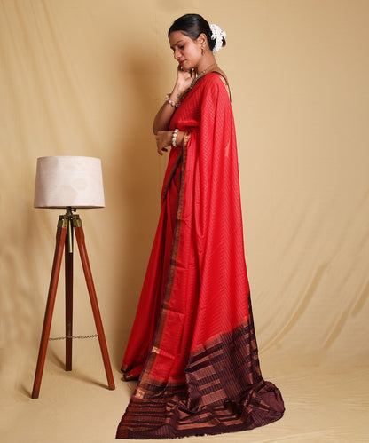 Stunning Red Saree with Ornate Zari Border and Festive Blouse