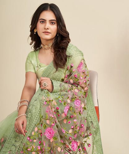 Mint Saree with Embroidered Borders and Pink Floral Patches