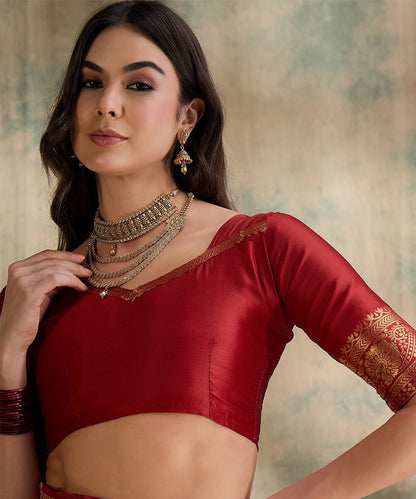 Red Saree with Gold Zari Motifs for a Regal Look