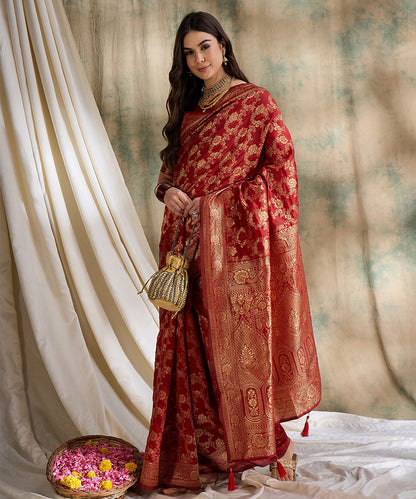 Red Saree with Gold Zari Motifs for a Regal Look