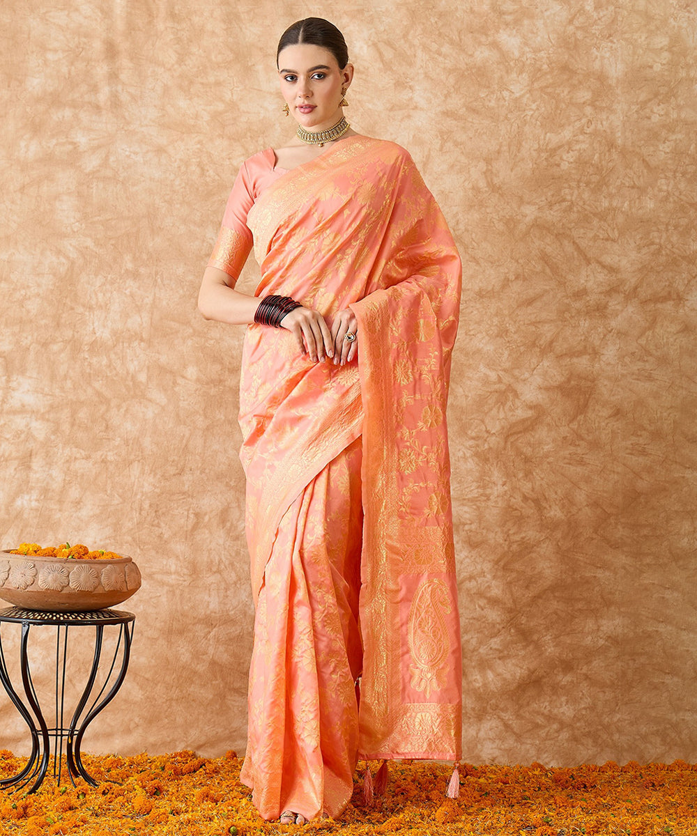 Peach Saree with Light Motifs and a Graceful Zari Border