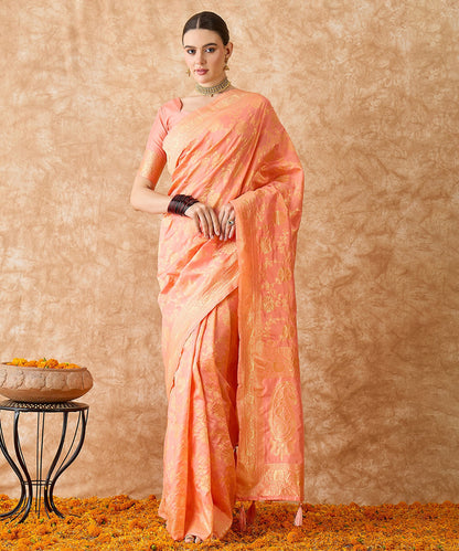 Peach Saree with Light Motifs and a Graceful Zari Border