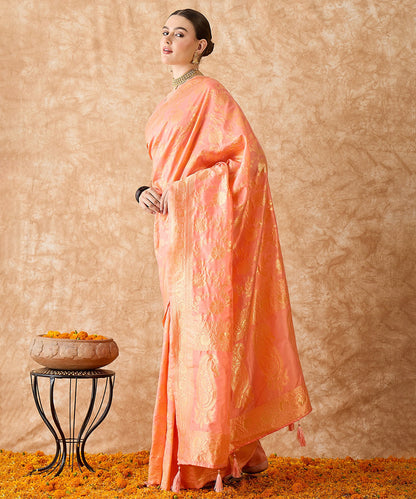 Peach Saree with Light Motifs and a Graceful Zari Border