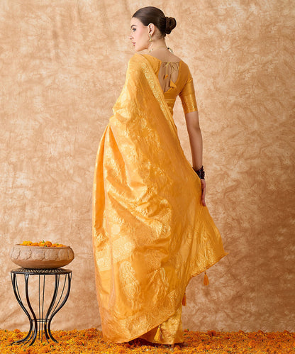 Mango Saree with Light Motifs and a Rich Zari Border