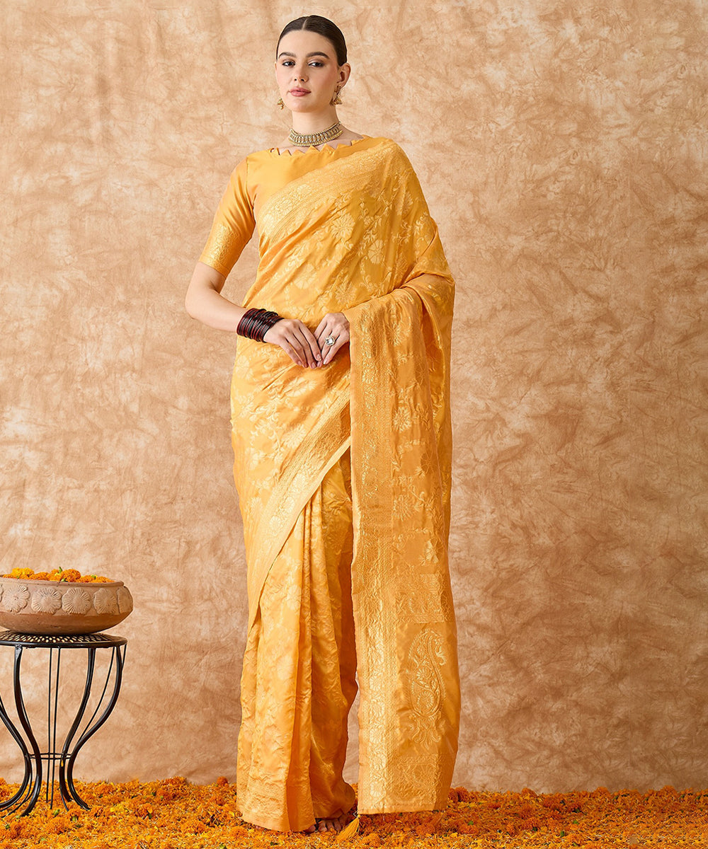 Mango Saree with Light Motifs and a Rich Zari Border