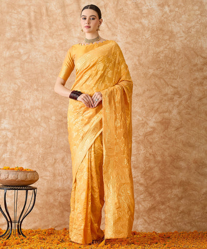 Mango Saree with Light Motifs and a Rich Zari Border