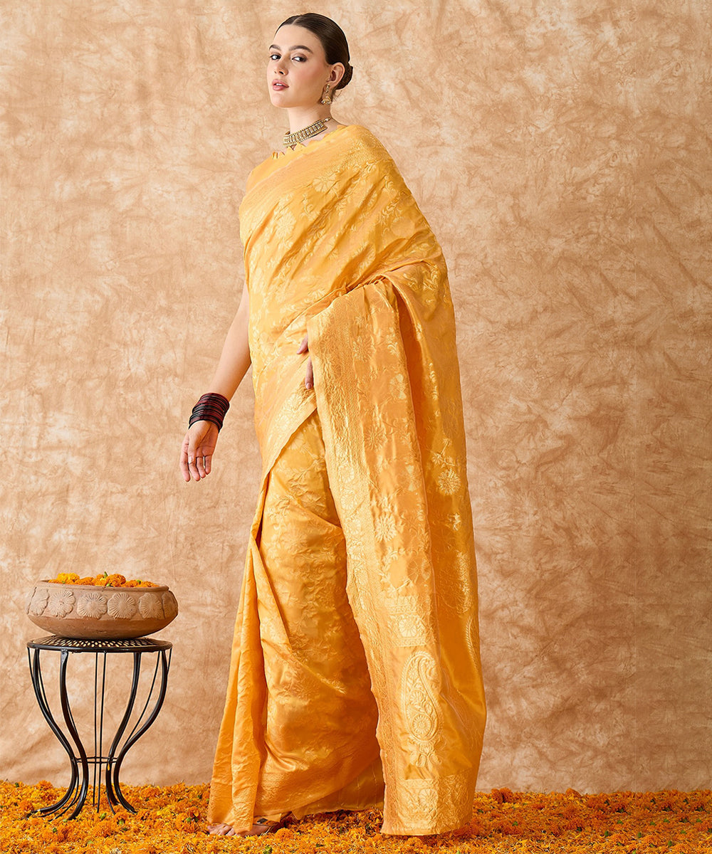 Mango Saree with Light Motifs and a Rich Zari Border