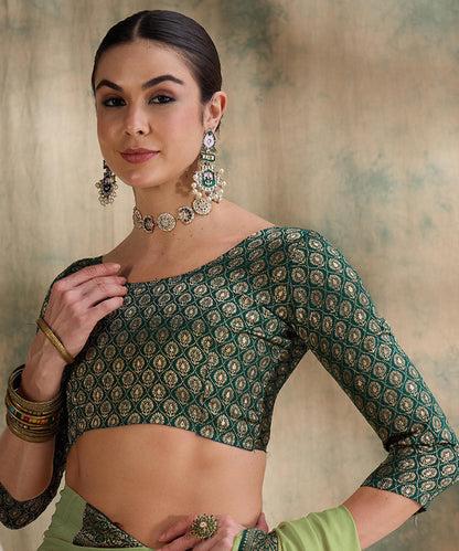 Light Green Saree with Zari Woven Border and Dark Green Blouse