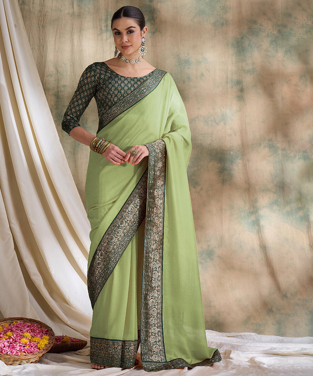 Light Green Saree with Zari Woven Border and Dark Green Blouse